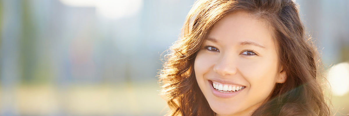 Woman smiling after a visit to Dr. Dane Andersen in Salmon Creek, WA